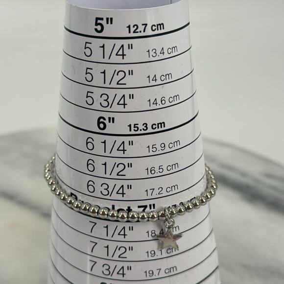 Silver stretchy beaded star bracelet - Picture 2 of 2